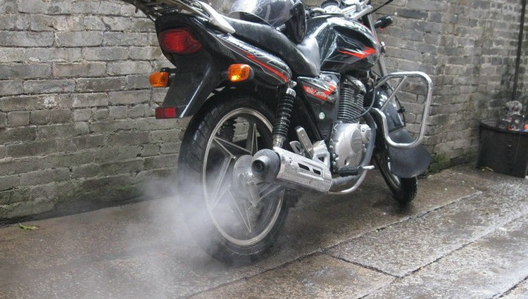 摩托车排气管冒黑烟是什么原因