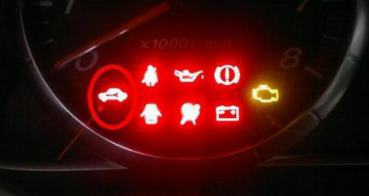 汽车仪表盘红色汽车指示灯在亮怎么回事